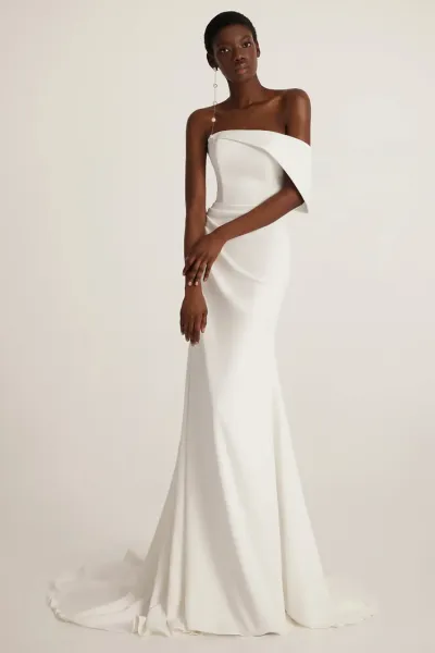 Robe de mariée ivoire ou noir en lycra chez Italie Cocktail à Nice